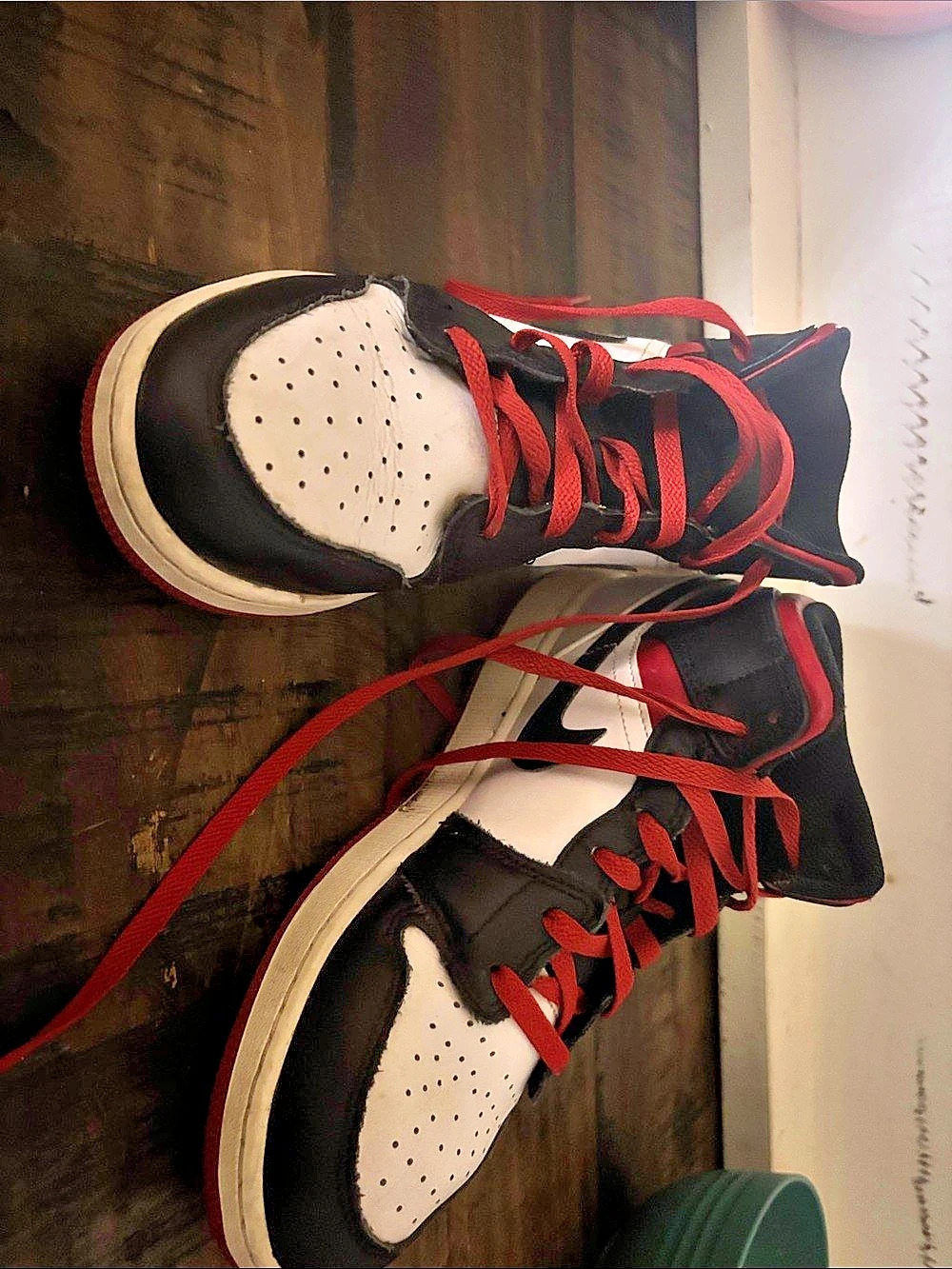 Nike Air Jordan 1 High Top Sneakers in Black & Red